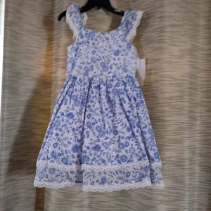 Brand new girls floral dress size 5